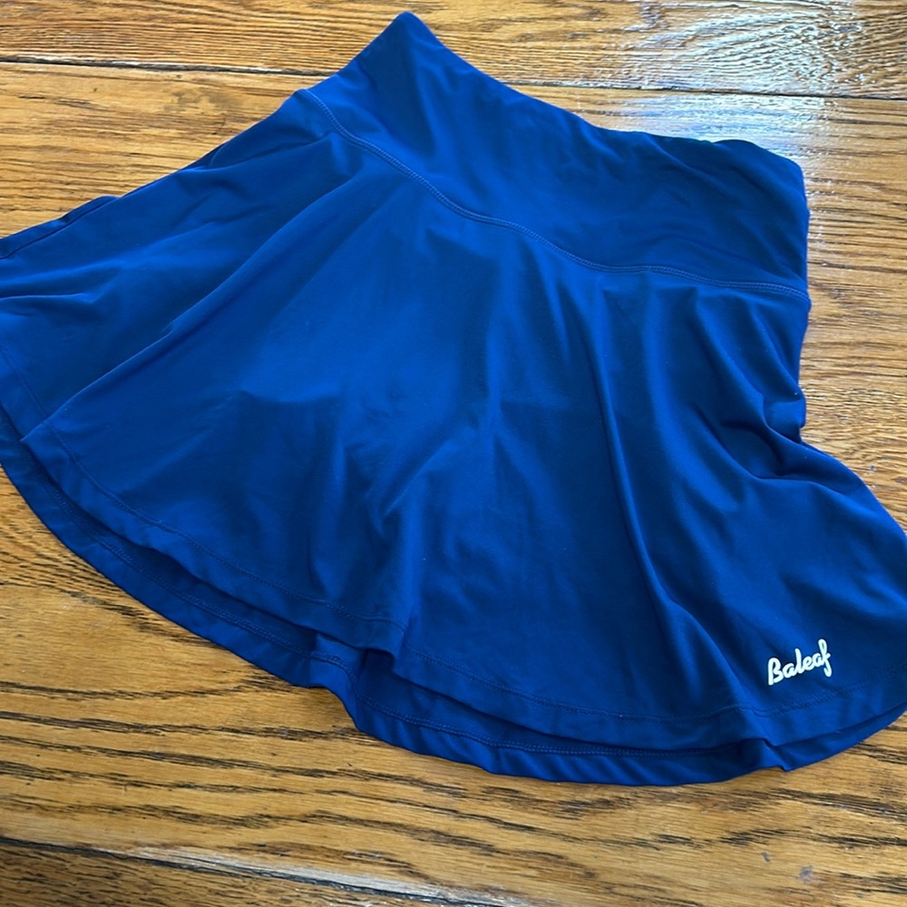 Baleaf mini tennis skort.  Navy Blue.  Great condition. Size Small.